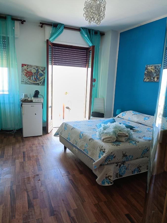 Апартаменты La Perla Sul Mare Монделло Экстерьер фото